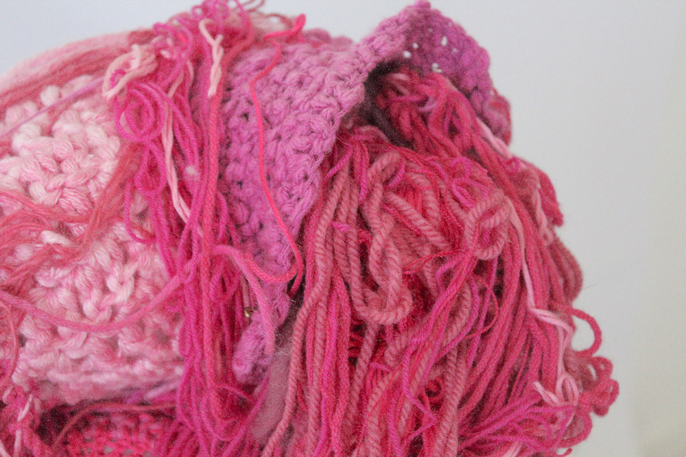Sara Al Haddad, self portrait, 2011, yarn, pins and cotton, variable dimensions