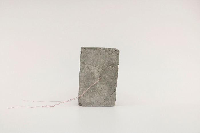 Sara Al Haddad, for self destruction #15, 2014, concrete_6.2x5.7x9.6cm, concrete and free form crocheted embroidery thread. Photo: Marwah Al Haddad