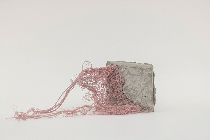 Sara Al Haddad, for self destruction #28, 2014, concrete_7.9x5.4x87.7cm, concrete and free form crocheted embroidery thread. Photo: Marwah Al Haddad