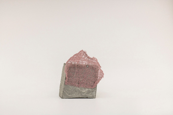 Sara Al Haddad, for self destruction #29, 2014, concrete_6.8x4.4x7cm, nail_0.45cm, concrete, nail and free form crocheted embroidery thread. Photo: Marwah Al Haddad