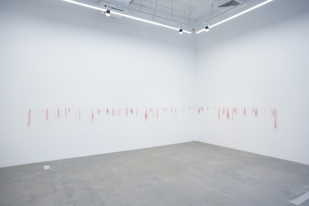 Sara Al Haddad, forget to remember, 2018, pink embroidery thread and pen on paper. Installation at Cuadro Fine Art Gallery