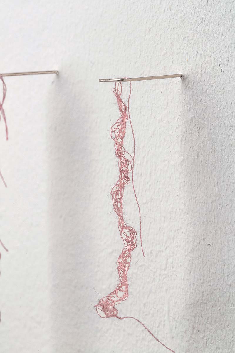 Sara Al Haddad, forget to remember, 2018, pink embroidery thread and pen on paper. Installation at Cuadro Fine Art Gallery